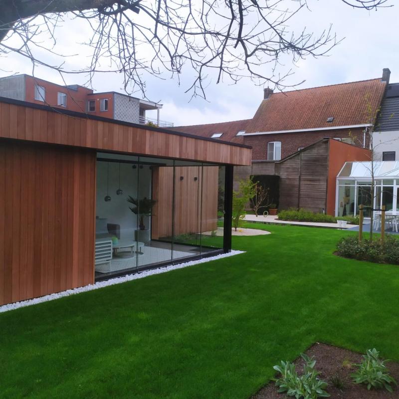 Tuinrenovatie - Aanleg grasmatten - zwem en visvijvers - verhardingen - kiezel met gravelmatten